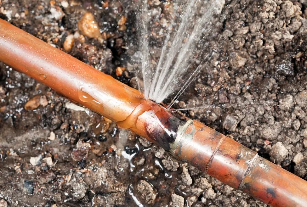 Exposed plumbing line during repair work