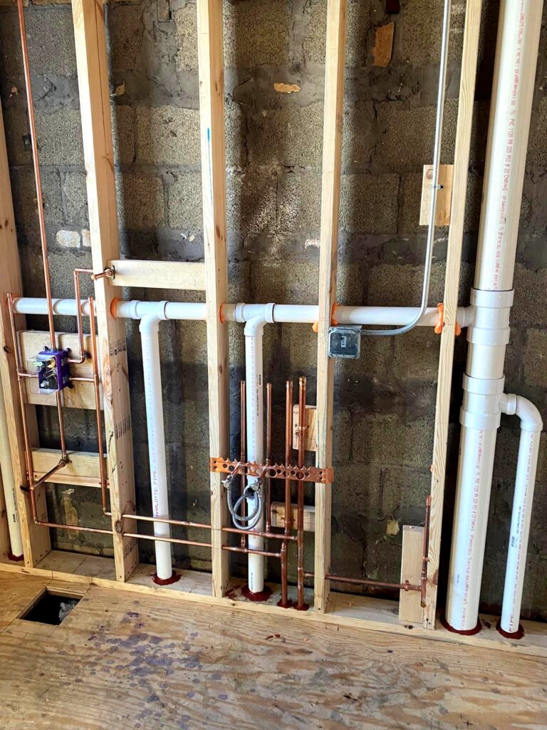 Copper and PVC plumbing rough-in installation